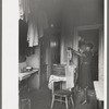 Kitchen of apartment occupied by Negroes, South Side of Chicago, Illinois