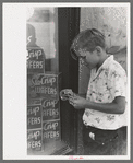 Schoolboy who collects match folders, Caldwell, Idaho