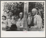 Spectators watch the baseball game on the Fourth of July at Vale, Oregon