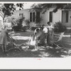 Putting the deck chairs out on the shady lawn, Caldwell, Idaho