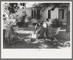 Putting the deck chairs out on the shady lawn, Caldwell, Idaho