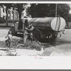 Filling the street-sprinkling wagon, Caldwell, Idaho