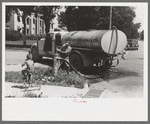 Filling the street-sprinkling wagon, Caldwell, Idaho