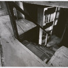Photograph of empty staged set design by Boris Aronson (staircase  looking downward)
