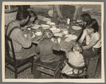 William Horavitch family eating dinner, Williams County, North Dakota