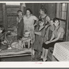 Family of Frank Peaches in their living room farm near Williston, North Dakota