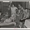 Family of Frank Peaches in their living room farm near Williston, North Dakota