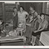 Family of Frank Peaches in their living room farm near Williston, North Dakota