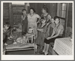 Family of Frank Peaches in their living room farm near Williston, North Dakota