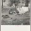 Indian woman washing clothes. Blueberry camp, Littlefork, Minnesota