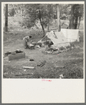 Indian woman washing clothes. Blueberry camp, Littlefork, Minnesota