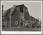 Threshing machine and barn near Littlefork, Minnesota