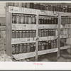 Canned fruits and vegetables in Edward Chapman's cellar, Northome, Minnesota