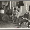 Lumberjacks waiting for the dinner horn. Camp near Effie, Minnesota