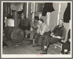 Lumberjacks waiting for the dinner horn. Camp near Effie, Minnesota