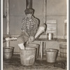 Lumberjack washing his feet. Camp near Effie, Minnesota
