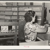 Removing packaged rice from conveyer. Ricemill, Abbeville, Louisiana