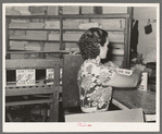 Removing packaged rice from conveyer. Ricemill, Abbeville, Louisiana