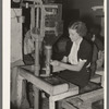 Filling cellophane sacks from automatic weighing machines. Abbeville, Louisana