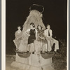 Sitting on decorated water trough watching the night parade at the National Rice Festival. Crowley, Louisiana