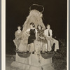 Sitting on decorated water trough watching the night parade at the National Rice Festival. Crowley, Louisiana