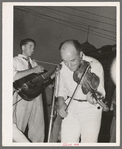 Musicians in Cajun band contest, National Rice Festival, Crowley, Louisiana. Most of the music was of the folk variety accompanied by singing