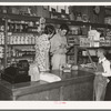 Making a sale, Lake Dick cooperative store. Lake Dick Project, Arkansas