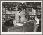 Making a sale, Lake Dick cooperative store. Lake Dick Project, Arkansas