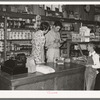 Making a sale, Lake Dick cooperative store. Lake Dick Project, Arkansas