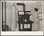 Stove and hot water boiler in farm home. Lake Dick Project, Arkansas