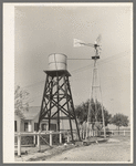 Windmill and water tower from which running water is available in home of Joseph La Blanc. Near Crowley, Louisiana