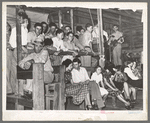 Men's section at fais-do-do near Crowley, Louisiana. Note ticket taker