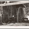 Old engine in abandoned sugar mill near Gibson, Louisana