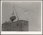 Loading sugarcane into boxcars near Delcambre, Louisiana