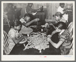 Pupils at school making rag rugs. Lakeview Project, Arkansas