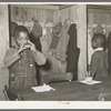 Children in nursery school drinking orange juice. This is given to them every morning at school. Lakeview Project, Arkansas