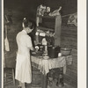 Mrs. Scarbrough in corner of kitchen. Laurel, Mississippi