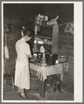 Mrs. Scarbrough in corner of kitchen. Laurel, Mississippi