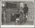 Negro mother teaching children numbers and alphabet in home of sharecropper. Transylvania, Louisiana