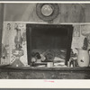 Mantel in Negro sharecropper's home. Transylvania, Louisiana
