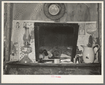 Mantel in Negro sharecropper's home. Transylvania, Louisiana