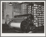 Warp winding machine with operator. Laurel mills, Laurel Mississippi