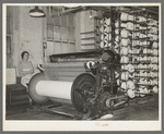 Warp winding machine with operator. Laurel mills, Laurel Mississippi