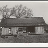 Dog trot cabin of Ed Bagget, sharecropper, near Laurel, Mississippi