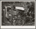 Pulling cotton into cotton "ropes" which, in later processes, are combined to make thread. Laurel mills, Laurel, Mississippi