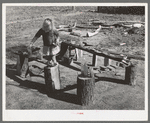Child of Ed Bagget, sharecropper, playing near Laurel, Mississippi