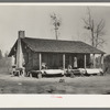 Farmhouse near Antioch with mattresses and bedding being aired. Mississippi