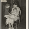 Mrs. Bagget and two children. Wife of sharecropper near Laurel, Mississippi