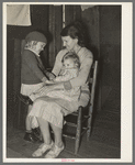 Mrs. Bagget and two children. Wife of sharecropper near Laurel, Mississippi