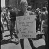 Donna Gottschalk holds "I am your worst fear I am your best fantasy" poster at Christopher Street Gay Liberation Day parade, 1970